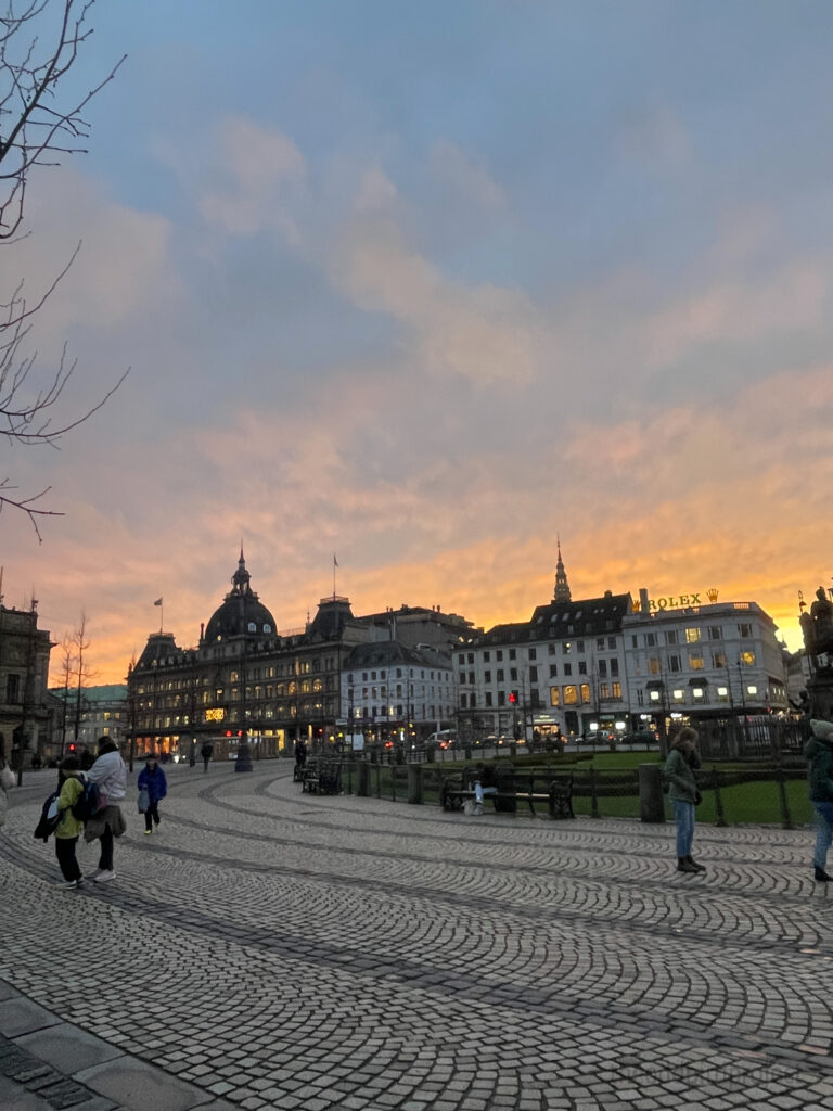 Sunset picture of buildings in a square in the center of Copenhagen